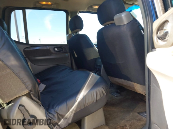 2003 GMC Envoy SLT z VIN 1GKET16S736233956, wystawiony jako IAAI lot #41844351 z przebiegiem 244 942 mil mil oraz . Historia ofert i sprzedaży dostępna na DreamBid. Obrazek 8.