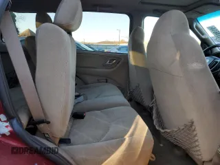 2001 Mazda Tribute LX with VIN 4F2CU08111KM19933, listed as a Copart auction lot 81174614 with 209,736 mi miles and Salvage Title. Bid and sale history available at DreamBid. Image 11.