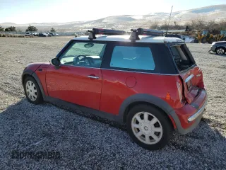 2004 MINI Hardtop with VIN WMWRC33434TC53820, listed as a Copart auction lot 85389994 with 164,452 mi miles and Salvage Title. Bid and sale history available at DreamBid. Image 2.