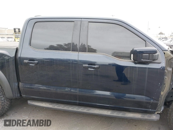 2023 Ford F-150 Raptor with VIN 1FTFW1RG1PFA87381, listed as a IAAI auction lot 41710758 with 19,626 mi miles and . Bid and sale history available at DreamBid. Image 14.