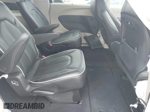 2023 Chrysler Pacifica Limited with VIN 2C4RC1GG8PR506134, listed as a IAAI auction lot 42554422 with 29,378 mi miles and . Bid and sale history available at DreamBid. Image 8.