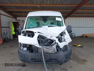 2024 Ford Transit Cargo with VIN 1FTBR1C83RKA91627, listed as a IAAI auction lot 41455595 with 12,010 mi miles and . Bid and sale history available at DreamBid. Image 13.