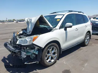 2015 Subaru Forester Touring with VIN JF2SJAWC8FH588321, listed as a IAAI auction lot 42689364 with 103,642 mi miles and . Bid and sale history available at DreamBid. Image 2.