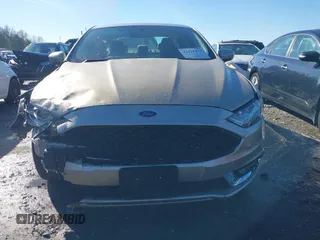2018 Ford Fusion S z VIN 3FA6P0UU8JR271589, wystawiony jako IAAI lot #41318471 z przebiegiem 148 793 mil mil oraz . Historia ofert i sprzedaży dostępna na DreamBid. Obrazek 13.