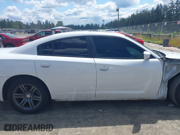 2014 Dodge Charger SXT z VIN 2C3CDXHG6EH267131, wystawiony jako IAAI lot #42321246 z przebiegiem 95 385 mil mil oraz . Historia ofert i sprzedaży dostępna na DreamBid. Obrazek 14.