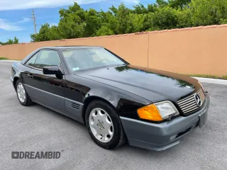 1994 Mercedes-Benz SL 5.0L with VIN WDBFA67E1RF102542, listed as a Copart auction lot 64461705 with 68,696 mi miles and Clean title. Bid and sale history available at DreamBid. Image 1.