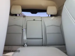 2023 Cadillac XT4 FWD Luxury z VIN 1GYAZAR46PF178003, wystawiony jako Copart lot #52024665 z przebiegiem 42 000 mil mil oraz Szkoda całkowita • Salvage title. Historia ofert i sprzedaży dostępna na DreamBid. Obrazek 10.