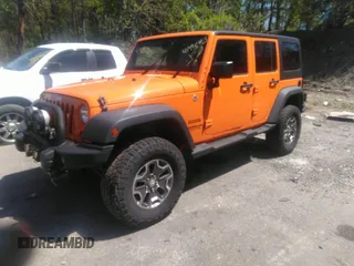 2013 Jeep Wrangler Unlimited Sport z VIN 1C4BJWDG7DL522421, wystawiony jako IAAI lot #41492425 z przebiegiem 55 921 mil mil oraz . Historia ofert i sprzedaży dostępna na DreamBid. Obrazek 2.