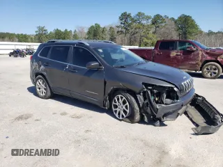2014 Jeep Cherokee Latitude with VIN 1C4PJLCS9EW180982, listed as a Copart auction lot 48673035 with 107,358 mi miles and Salvage Title. Bid and sale history available at carsss.com. Image 4.