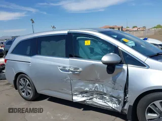 2014 Honda Odyssey Touring с VIN 5FNRL5H98EB070983, выставлен на аукционе IAAI как лот 42328380 с пробегом Не указан миль и . История ставок и продаж доступна на DreamBid. Изображение 6.