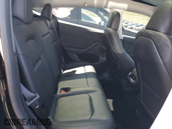 2023 Tesla Model Y Long Range with VIN 7SAYGDEE5PF850358, listed as a Copart auction lot 52581615 with 19,376 mi miles and Salvage Title. Bid and sale history available at DreamBid. Image 11.