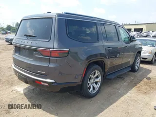 2023 Jeep Wagoneer Series II Carbide с VIN 1C4SJVBPXPS515874, выставлен на аукционе IAAI как лот 42536034 с пробегом 56 284 миль миль и . История ставок и продаж доступна на DreamBid. Изображение 4.