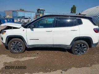 2021 Jeep Compass Trailhawk with VIN 3C4NJDDB0MT551172, listed as a IAAI auction lot 40155947 with 50,794 mi miles and . Bid and sale history available at DreamBid. Image 14.