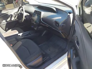 2021 Toyota Prius L Eco with VIN JTDKAMFU7M3148089, listed as a IAAI auction lot 41614915 with 119,725 mi miles. Bid and sale history available at carsss.com. Image 5.