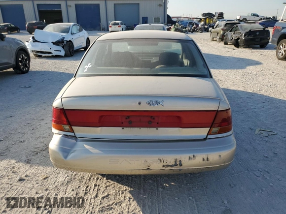 1998 Saturn SL with VIN 1G8ZK5270WZ273902, listed as a Copart auction lot 73430844 with Not provided miles and Salvage title. Bid and sale history available at DreamBid. Image 6.