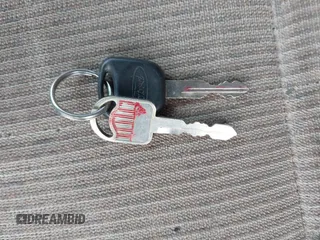 1999 Mercury Mystique GS z VIN 1MEFM6538XK606647, wystawiony jako IAAI lot #41613999 z przebiegiem 90 978 mil mil oraz . Historia ofert i sprzedaży dostępna na DreamBid. Obrazek 11.