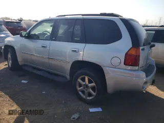 2007 GMC Envoy SLT with VIN 1GKDS13S572158514, listed as a Copart auction lot 74208144 with 209,797 mi miles and Salvage Title. Bid and sale history available at carsss.com. Image 2.