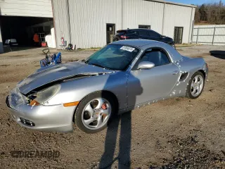 2002 Porsche Boxster S z VIN WP0CB29862U660759, wystawiony jako Copart lot #87084074 z przebiegiem 129 522 mil mil oraz Szkoda całkowita • Salvage title. Historia ofert i sprzedaży dostępna na DreamBid. Obrazek 1.