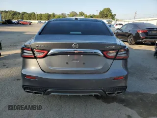 2023 Nissan Maxima Platinum with VIN 1N4AA6FV4PC505934, listed as a Copart auction lot 74889614 with 10,454 mi miles and Salvage title. Bid and sale history available at DreamBid. Image 6.