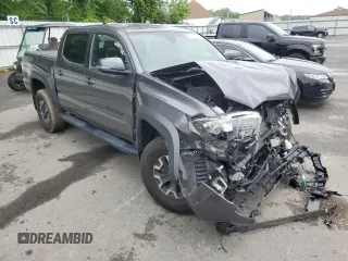 2021 Toyota Tacoma SR z VIN 3TYCZ5ANXMT050566, wystawiony jako Copart lot #57315615 z przebiegiem Nie podano mil oraz Szkoda całkowita • Salvage title. Historia ofert i sprzedaży dostępna na DreamBid. Obrazek 4.