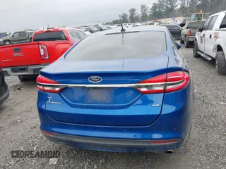 2017 Ford Fusion SE z VIN 3FA6P0H77HR309263, wystawiony jako IAAI lot #41914769 z przebiegiem 136 833 mil mil oraz . Historia ofert i sprzedaży dostępna na DreamBid. Obrazek 15.