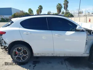 2019 Alfa Romeo Stelvio Ti Lusso z VIN ZASPAKBN1K7C36934, wystawiony jako IAAI lot #41534732 z przebiegiem Nie podano mil oraz . Historia ofert i sprzedaży dostępna na DreamBid. Obrazek 14.