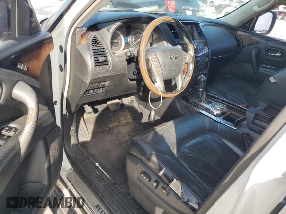 2012 Infiniti QX56 8-passenger with VIN JN8AZ2ND7C9715587, listed as a Copart auction lot 64508345 with 217,786 mi miles and Salvage title. Bid and sale history available at DreamBid. Image 8.