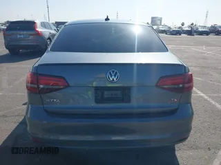 2016 Volkswagen Jetta Sport z VIN 3VWD17AJ5GM231530, wystawiony jako IAAI lot #41968152 z przebiegiem 85 474 mil mil oraz . Historia ofert i sprzedaży dostępna na DreamBid. Obrazek 16.