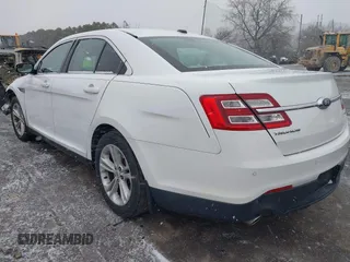 2015 Ford Taurus SEL with VIN 1FAHP2E85FG152256, listed as a IAAI auction lot 41971204 with 120,102 mi miles and . Bid and sale history available at carsss.com. Image 3.
