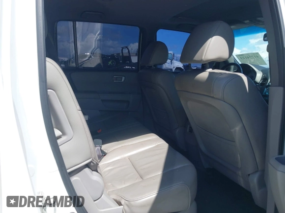 2013 Honda Pilot EX-L with VIN 5FNYF3H74DB034759, listed as a IAAI auction lot 41774123 with 142,782 mi miles and . Bid and sale history available at DreamBid. Image 8.