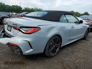2024 BMW 4 Series M440i xDrive with VIN WBA63AT06RCP05994, listed as a Copart auction lot 62068824 with Not provided miles and Salvage title. Bid and sale history available at DreamBid. Image 3.
