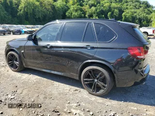 2018 BMW X5 M z VIN 5YMKT6C54J0Y83460, wystawiony jako Copart lot #57874275 z przebiegiem 58 656 mil mil oraz Szkody całkowita. Historia ofert i sprzedaży dostępna na DreamBid. Obrazek 2.