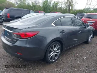 2014 Mazda 6 i Grand Touring с VIN JM1GJ1W66E1141962, выставлен на аукционе IAAI как лот 42119753 с пробегом 187 514 миль миль и . История ставок и продаж доступна на DreamBid. Изображение 4.