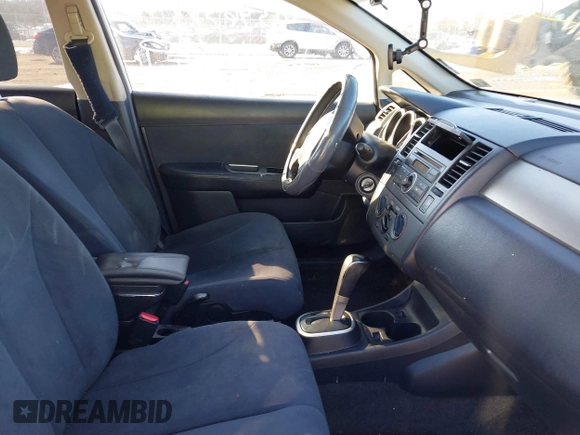 2009 Nissan Versa S with VIN 3N1BC11E19L394465, listed as a IAAI auction lot 41346553 with 159,983 mi miles and . Bid and sale history available at DreamBid. Image 5.