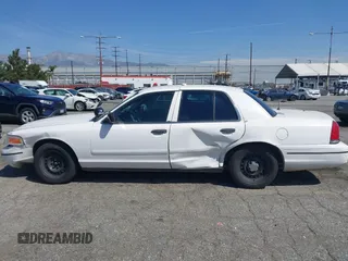 1999 Ford Crown Victoria Police с VIN 2FAFP71W1XX200937, выставлен на аукционе IAAI как лот 41977836 с пробегом 186 379 миль миль и . История ставок и продаж доступна на DreamBid. Изображение 14.