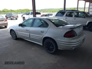 2001 Pontiac Grand Am SE with VIN 1G2NE52T81M648017, listed as a IAAI auction lot 42354372 with 206,086 mi miles and . Bid and sale history available at DreamBid. Image 3.