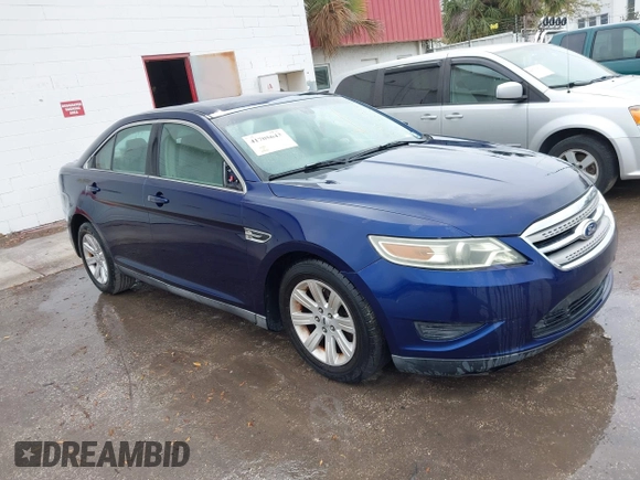 2011 Ford Taurus SE with VIN 1FAHP2DW7BG128857, listed as a IAAI auction lot 41705643 with 163,589 mi miles. Bid and sale history available at carsss.com. Image 1.