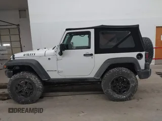 2016 Jeep Wrangler Sport with VIN 1C4AJWAG9GL261958, listed as a IAAI auction lot 41595490 with 32,433 mi miles and . Bid and sale history available at carsss.com. Image 14.