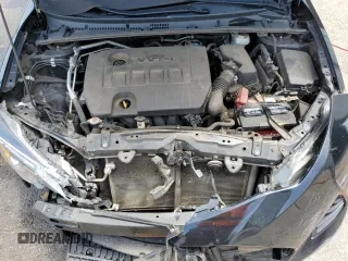 2019 Toyota Corolla L z VIN 2T1BURHE9KC205598, wystawiony jako Copart lot #56741185 z przebiegiem 201 573 mil mil oraz Szkoda całkowita • Salvage title. Historia ofert i sprzedaży dostępna na DreamBid. Obrazek 11.