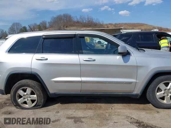 2013 Jeep Grand Cherokee Laredo with VIN 1C4RJFAG5DC634685, listed as a IAAI auction lot 41792147 with 260,594 mi miles. Bid and sale history available at carsss.com. Image 13.