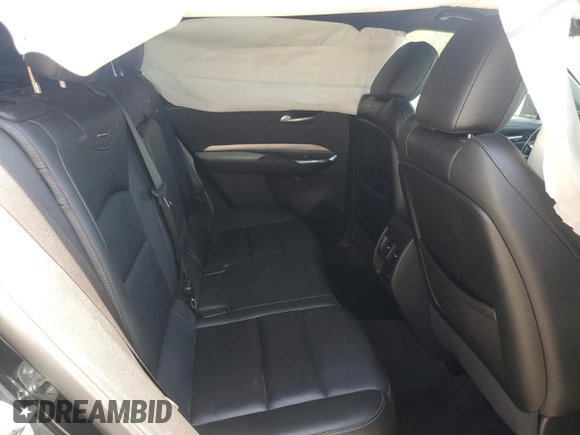 2021 Cadillac XT4 FWD Premium Luxury z VIN 1GYFZCR48MF002468, wystawiony jako Copart lot #50878955 z przebiegiem 76 034 mil mil oraz Szkoda całkowita • Salvage title. Historia ofert i sprzedaży dostępna na DreamBid. Obrazek 10.