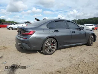 2022 BMW 3 Series M340i xDrive with VIN WBA5U9C02NFL65825, listed as a Copart auction lot 60244064 with 22,548 mi miles and Salvage Title. Bid and sale history available at DreamBid. Image 3.