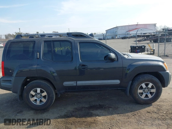 2012 Nissan Xterra S with VIN 5N1AN0NW1CC509953, listed as a IAAI auction lot 41782792 with 153,613 mi miles and . Bid and sale history available at DreamBid. Image 14.