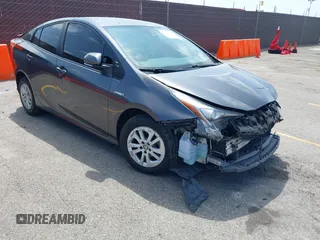 2018 Toyota Prius Two z VIN JTDKBRFU7J3060603, wystawiony jako IAAI lot #42359586 z przebiegiem 102 042 mil mil oraz . Historia ofert i sprzedaży dostępna na DreamBid. Obrazek 1.