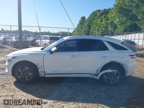 2023 Genesis GV70 2.5T with VIN KMUMADTB7PU120364, listed as a IAAI auction lot 42186139 with 24,686 mi miles and . Bid and sale history available at DreamBid. Image 14.