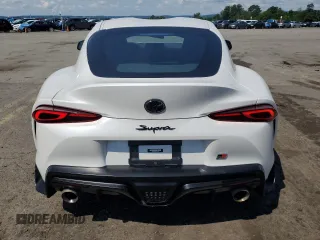 2023 Toyota Supra 3.0 with VIN WZ1DB0G09PW060627, listed as a Copart auction lot 65894025 with 26,657 mi miles and Salvage title. Bid and sale history available at DreamBid. Image 6.