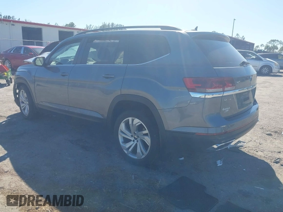 2021 Volkswagen Atlas SE with VIN 1V2WR2CA3MC602149, listed as a IAAI auction lot 41845288 with 59,941 mi miles and . Bid and sale history available at DreamBid. Image 3.