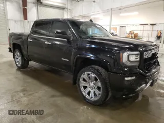 2017 GMC Sierra 1500 Denali z VIN 3GTU2PEJ7HG243799, wystawiony jako Copart lot #53297915 z przebiegiem 98 580 mil mil oraz Szkoda całkowita • Salvage title. Historia ofert i sprzedaży dostępna na DreamBid. Obrazek 4.