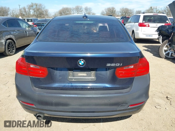 2015 BMW 3 Series 320i with VIN WBA3B1C53FK138310, listed as a IAAI auction lot 41677208 with 57,891 mi miles. Bid and sale history available at carsss.com. Image 16.