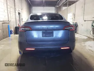2021 Tesla Model Y Performance with VIN 5YJYGDEF2MF134700, listed as a Copart auction lot 56325685 with 66,730 mi miles and Salvage Title. Bid and sale history available at DreamBid. Image 6.